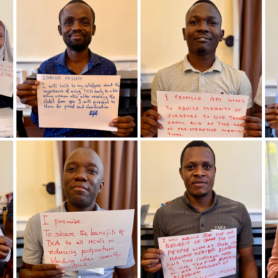 People holding pledge cards