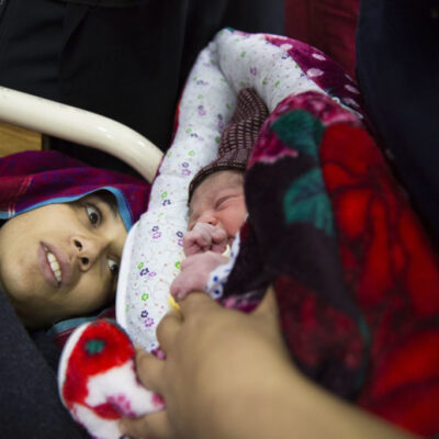 Sobia Sajid's meets her newborn baby at the high risk postnatal ward after suffering from postpartum haemorrhaging during labour at the Holy Family Hospital on March 6, 2019 in Rawalpindi, Pakistan. Saiyna Bashir © Wellcome Trust